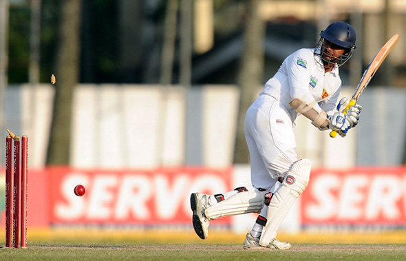 590_Del6173449.jpg Kumar Sangakkara is bowled off his thigh pad