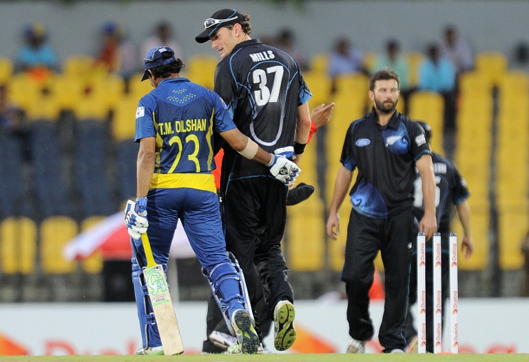 000_Del6264672.jpg Dilshan and Mills walk off together as rain halts play