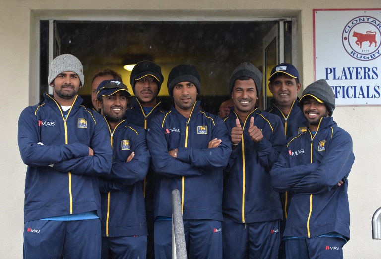 000_DV1719781.jpg Sri Lankan players look on as rain falls down in Ireland