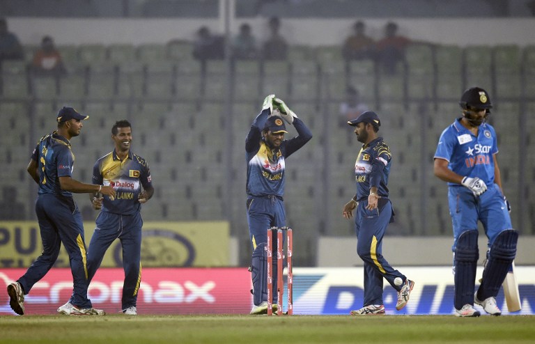 000_8d5ed.jpg Sri Lanka's players celebrate