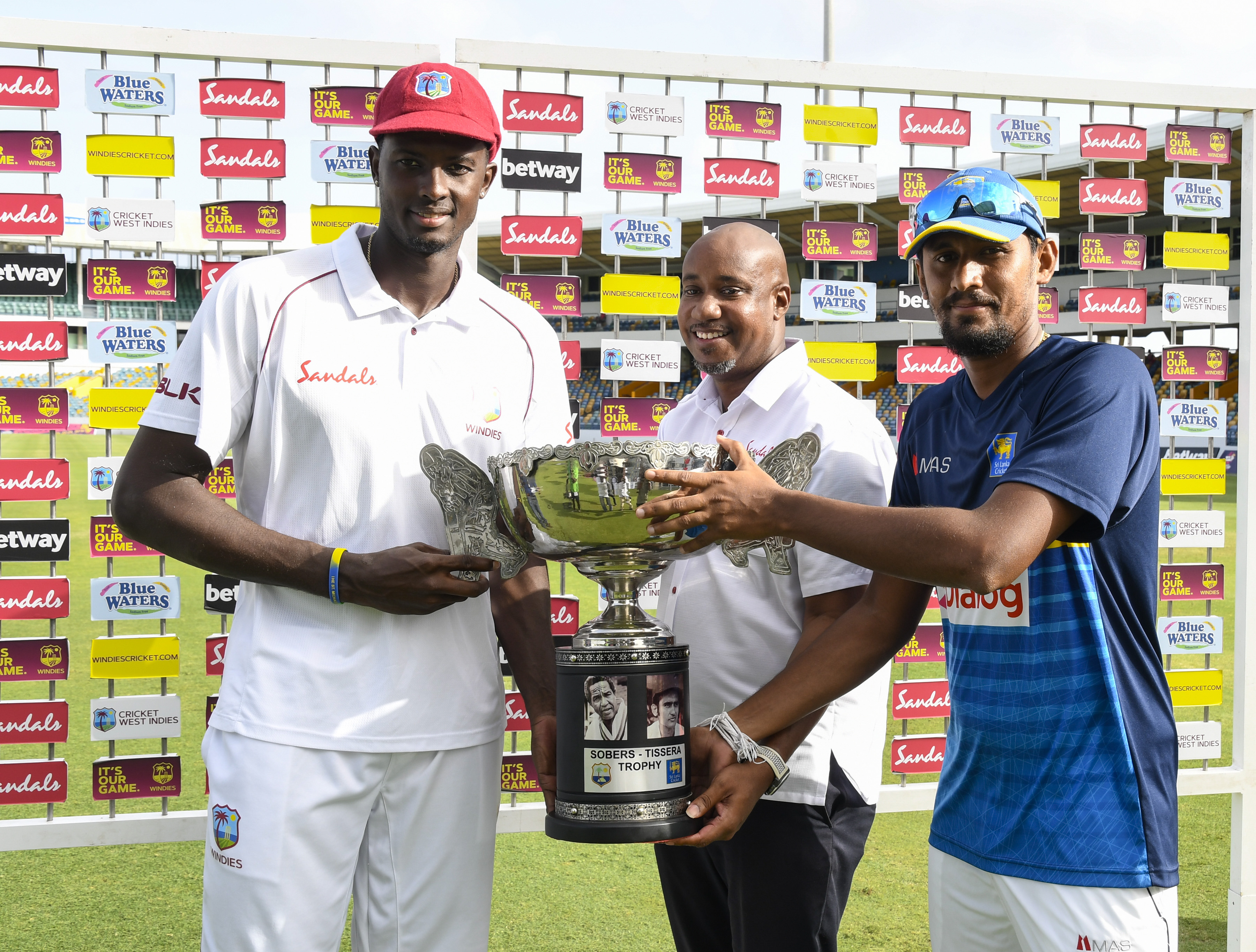 42980310882_429ea29f0f_o.jpg Jason Holder and Suranga Lakmal pose with the Sobers-Tissera Trophy